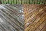 Before and after picture of a pressure washed deck