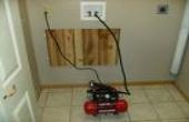 Clearing the plumbing lines with air pressure
